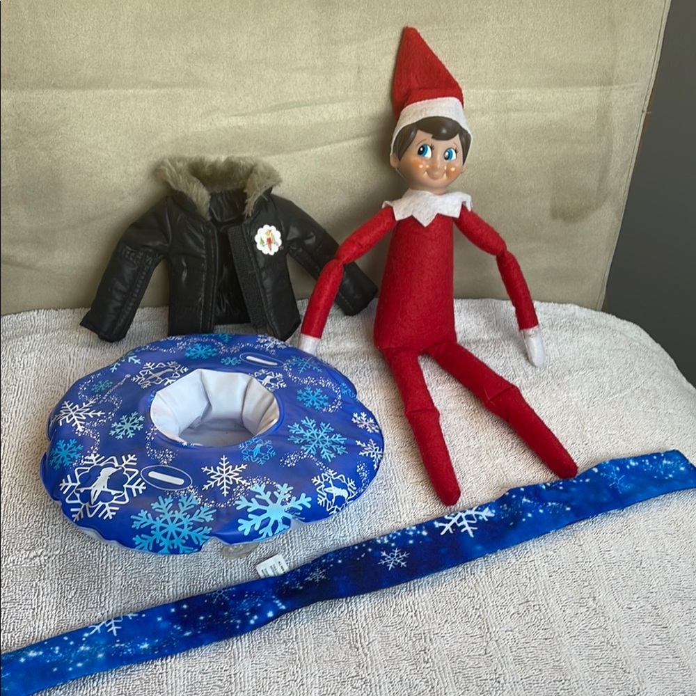 Elf on the Shelf and accessories- leather like jacket, snow tube and scarf